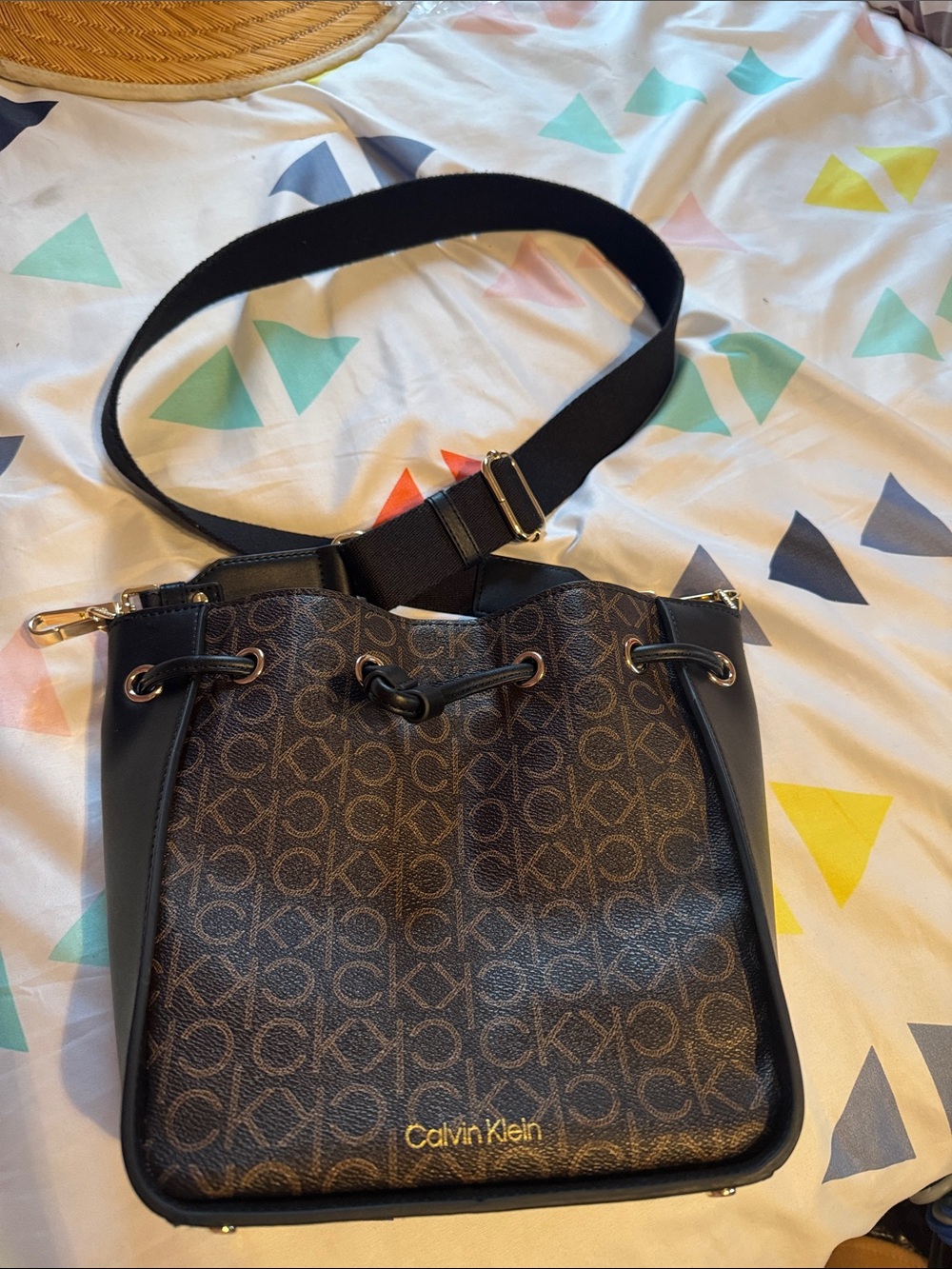Calvin Klein Brown Monogram Bucket Crossbody with Black Strap